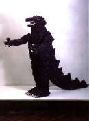 Corrado Bonomi, Godzilla, 1996, pezzi di pneumatico, led, autoparlanti, sensore e stagnola, 120 x 80 x 160 cm (Courtesy Galleria Ciocca, Milano)