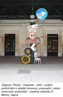 Eugenio Tibaldi - Trapianto - 2008 - cartelli pubblicitari e stradali dismessi, pneumatici, sedia - dimensioni ambientali - courtesy Umberto Di Marino, Napoli