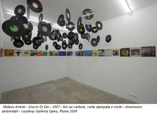 Stefano Arienti - Dischi Di Dei - 2007 - fori su cartone, carta stampata e vinile - dimensioni ambientali - courtesy Galleria Sales, Roma 2009