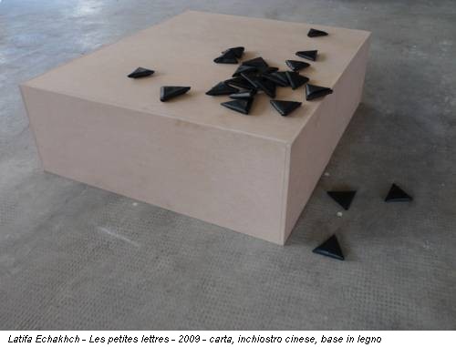 Latifa Echakhch - Les petites lettres - 2009 - carta, inchiostro cinese, base in legno