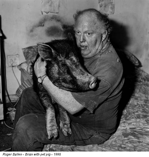 Roger Ballen - Brian with pet pig - 1998