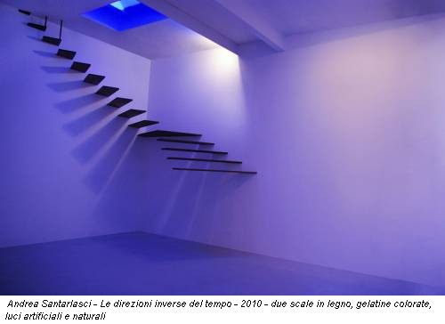 Andrea Santarlasci - Le direzioni inverse del tempo - 2010 - due scale in legno, gelatine colorate, luci artificiali e naturali