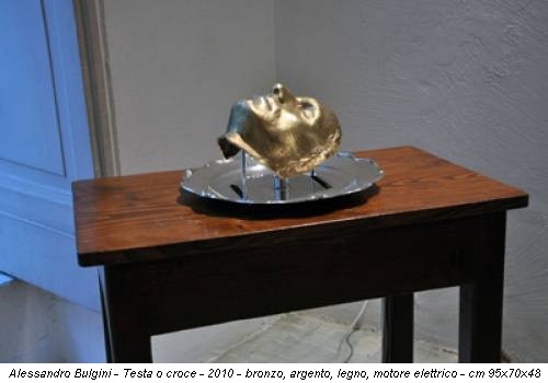 Alessandro Bulgini - Testa o croce - 2010 - bronzo, argento, legno, motore elettrico - cm 95x70x48