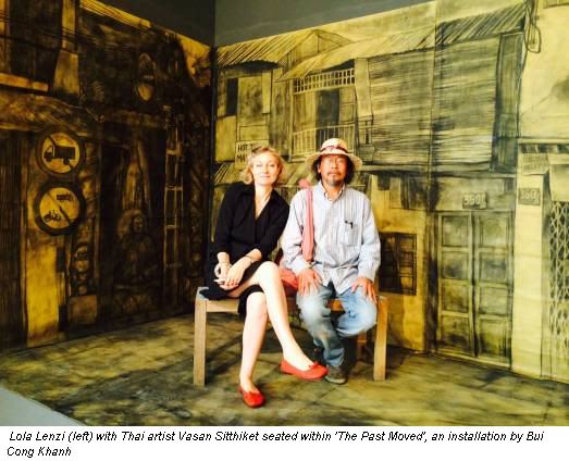 Lola Lenzi (left) with Thai artist Vasan Sitthiket seated within 'The Past Moved', an installation by Bui Cong Khanh