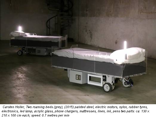 Carsten Holler, Two roaming beds (grey), (2015) painted steel, electric motors, nylon, rubber tyres, electronics, led lamp, acrylic glass, phone chargers, mattresses, linen, ink, pens two parts: ca. 130 x 210 x 100 cm each; speed: 0.7 metres per min