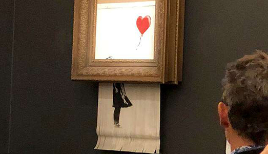 Sotheby’s distratta o complice? Il post Banksy tritato