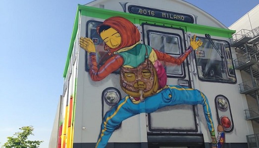 Ecco il primo, grandioso, intervento italiano degli Osgemeos, all’esterno del Cubo di HangarBicocca. E non chiamatela soltanto street art! Ecco il primo, grandioso, intervento italiano degli Osgemeos, all’esterno del Cubo di HangarBicocca. E non chiamatela soltanto street art!