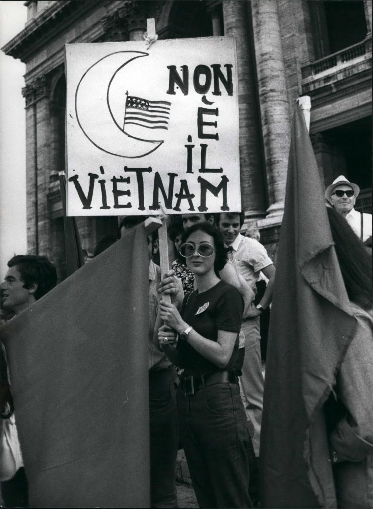Jul. 07, 1969 - A meeting was held in Piazza San Giovani, in from to the Basilica of St. John, by the Italian Communist Party, to protect against the actual government crisis and the political situation of now. Photo Shows Slogan against the United States, ''The moon is not the Vietnam'