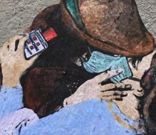 L’amore ai tempi del Coronavirus: il murales di Tvboy a Milano