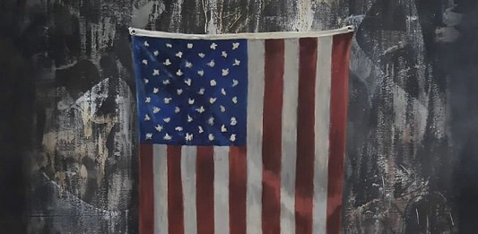 Banksy per Floyd: una bandiera americana che inizia a bruciare L'opera di Banksy per George Floyd