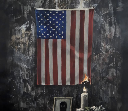 Banksy per Floyd: una bandiera americana che inizia a bruciare L'opera di Banksy per George Floyd