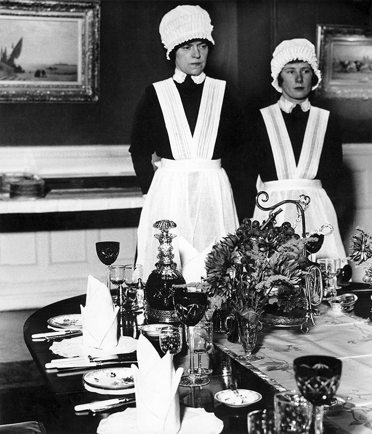 Bill Brandt Parlourmaid and Under-parlourmaid ready to serve dinner, 1936 Private collection, Courtesy Bill Brandt Archive and Edwynn Houk Gallery. © Bill Brandt / Bill Brandt Archive Ltd.