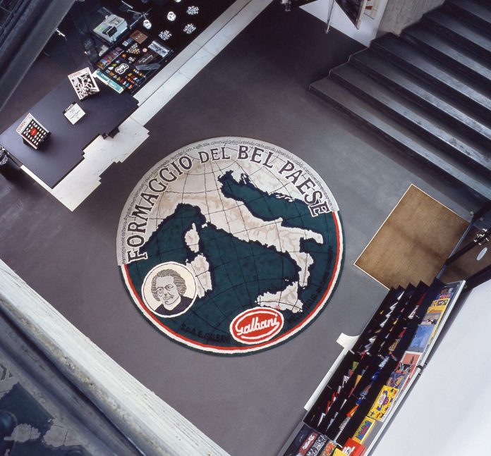 Maurizio Cattelan, Il Bel Paese, 1994. Wool carpet. Diameter 320 cm. Fondazione Sandretto Re Rebaudengo, Turin. Installation view: Soggetto-Soggetto. Una nuova relazione nell’arte di oggi, Castello di Rivoli, Museo d’Arte Contemporanea, Rivoli-Turin, June24-August 28, 1994. Photo: Paolo Pellion di Persano. Courtesy, Maurizio Cattelan’s Archive Maurizio Cattelan, Il Bel Paese, 1994. Wool carpet. Diameter 320 cm. Fondazione Sandretto Re Rebaudengo, Turin. Installation view: Soggetto-Soggetto. Una nuova relazione nell’arte di oggi, Castello di Rivoli, Museo d’Arte Contemporanea, Rivoli-Turin, June24-August 28, 1994. Photo: Paolo Pellion di Persano. Courtesy, Maurizio Cattelan’s Archive