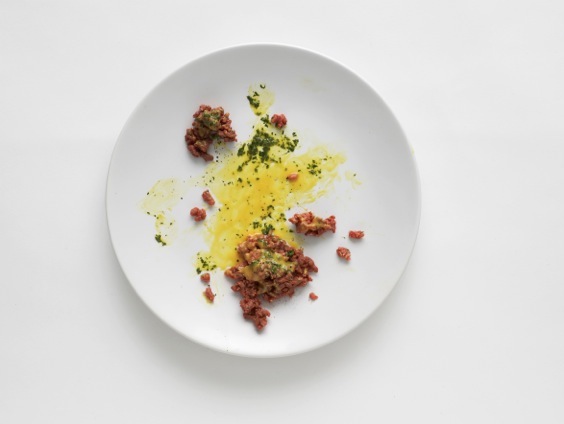 Simon Dybbroe Møller, Negative Plate (Steak Tartare), 2013, Porcelain plate, polyurethane resin, polyurethane varnish, silicone, dried herbs/ pepper,27.6×27.6×3.1 cm