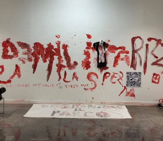 Demilitarizzare La Spezia: un artista e attivista condannato a tre mesi di carcere per una scritta Demilitarizzare La Spezia artista