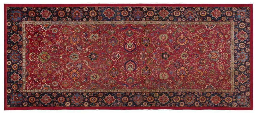 Baron Edmond de Rothschild Royal Safavid red-ground 'palmette and bird' carpet possibly Qazvin, North Persia, third quarter of the 16th century 16ft.3in. x 7ft. (494cm. x 213cm)