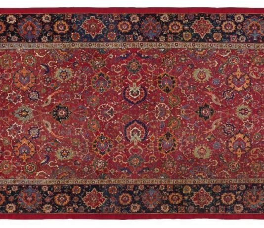 Christie’s, il tappeto di sir Edmond de Rothschild punta a quota £ 3 milioni Baron Edmond de Rothschild Royal Safavid red-ground 'palmette and bird' carpet possibly Qazvin, North Persia, third quarter of the 16th century 16ft.3in. x 7ft. (494cm. x 213cm)