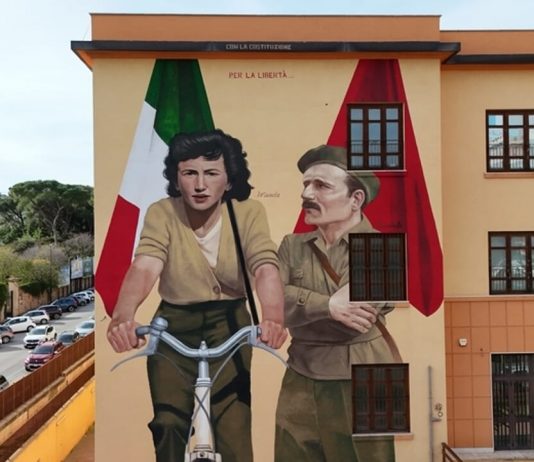 Una bandiera rossa nel murales per la Resistenza: scoppia la polemica a Palermo