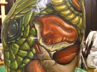 Il peccato rappresentato dalle mele di diverso colore, il Serpente tentatore per eccellenza, in questo caso quattro... La mela verde, il peccato "ordinario", la mela rossa, il peccato "straordinario"...