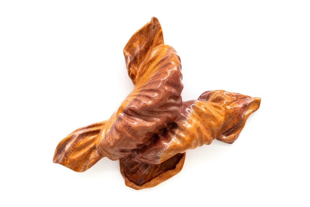 Lynda Benglis – Nutty Romancehttps://www.exibart.com/repository/media/formidable/11/img/f5a/2024_Twin-Cable-red-travertine-onyx-87-x-105-x-32-cm-1068x712.jpg